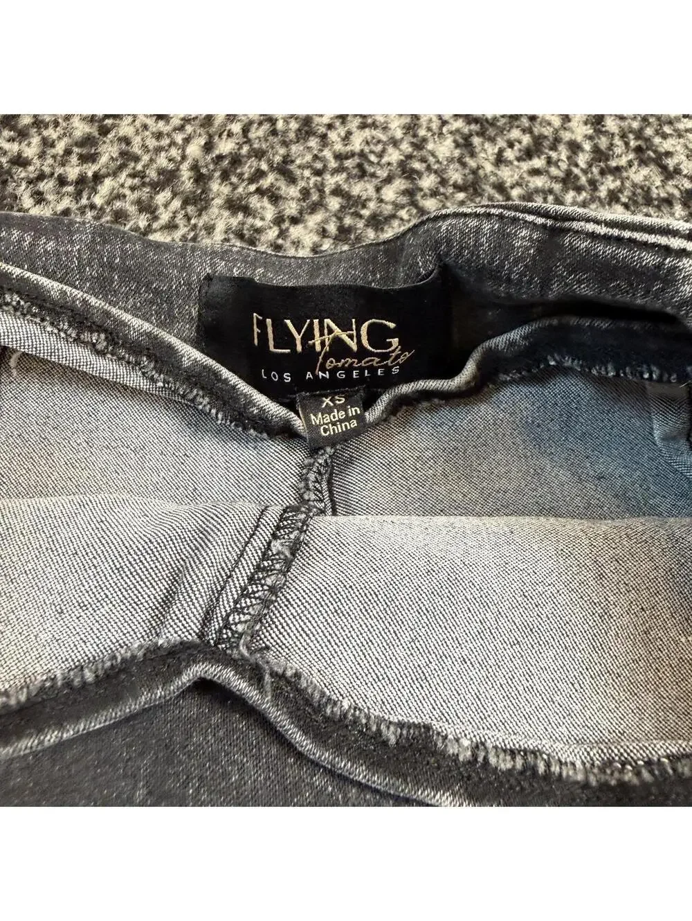 Flying Tomato black denim mini skirt with white stitching, size XS